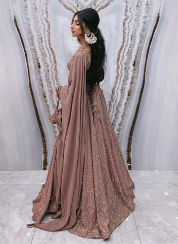 Designer light brown embroidered thread work georgette lehenga choli.